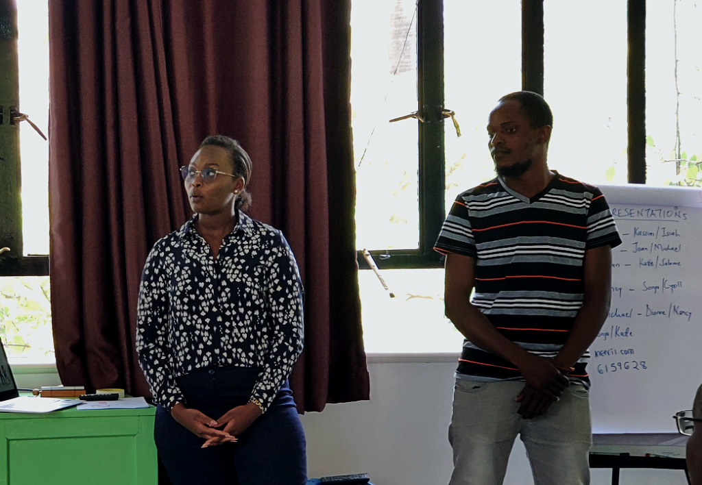 Joan and Kassim fro Penda Health presenting their Business Innovation Project (BIP)