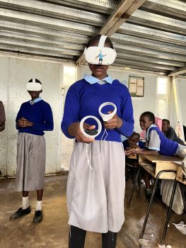 primary school students in Nairobi Kenya using virtual reality headsets to learn